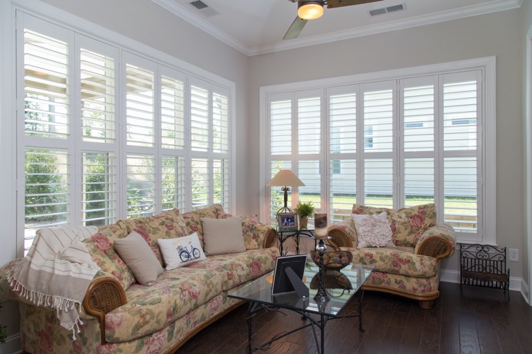 Traditional sunroom with plantation shutters in Orlando.
